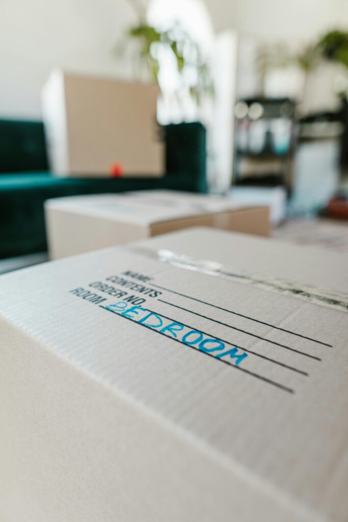 move-out cleaning cost Houston packed moving boxes for end of lease cleaning